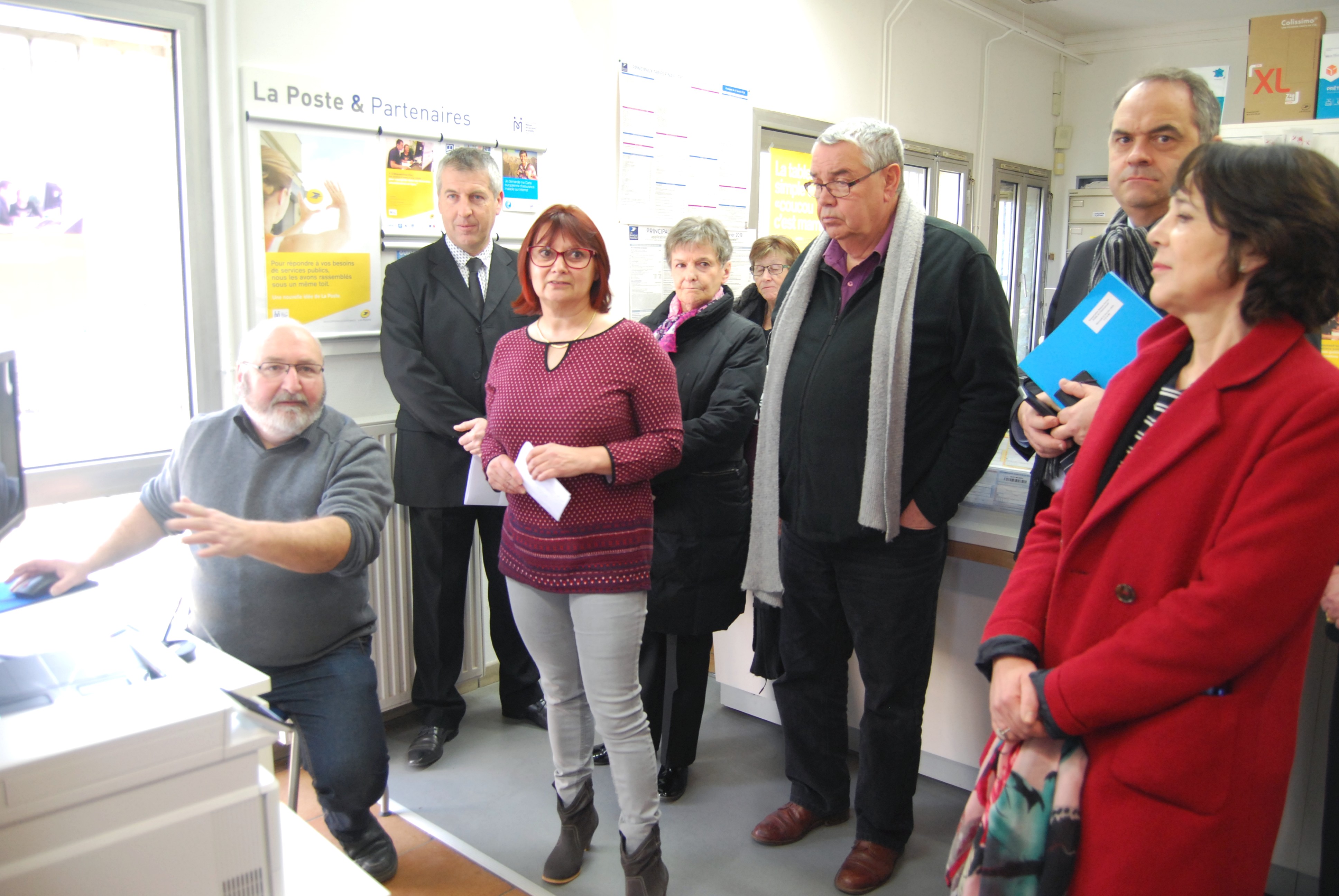 Micheline Jouneau and Brunot Merlot (left), customer service representatives at the public service centre, offer guidance to customers.